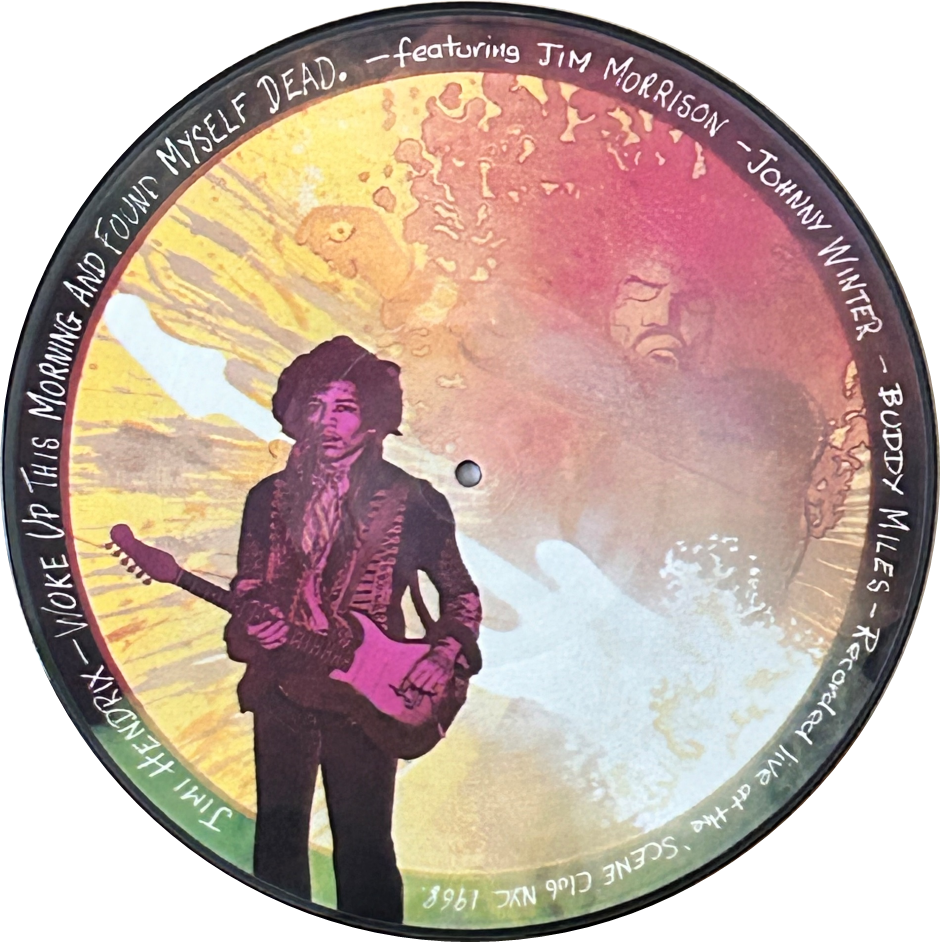Jimi Hendrix – Woke Up and Found Myself Dead picture disc is a powerful collector’s release that captures a raw, late-night jam session recorded in New York City in 1968. Featuring Hendrix alongside rock legends like Jim Morrison and Johnny Winter, this disc showcases the unfiltered energy of musicians simply letting loose. Pressed with bold artwork directly on the vinyl, it’s both a striking display piece and a unique listen — a rare chance to experience Hendrix in an unpolished, spontaneous setting that reveals his fiery improvisational spirit.
